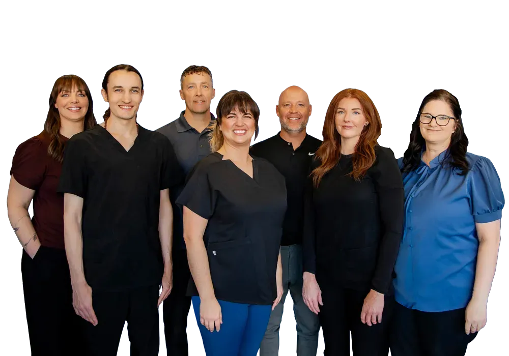 Brent Babcock And Troy Davis smiling with their team.